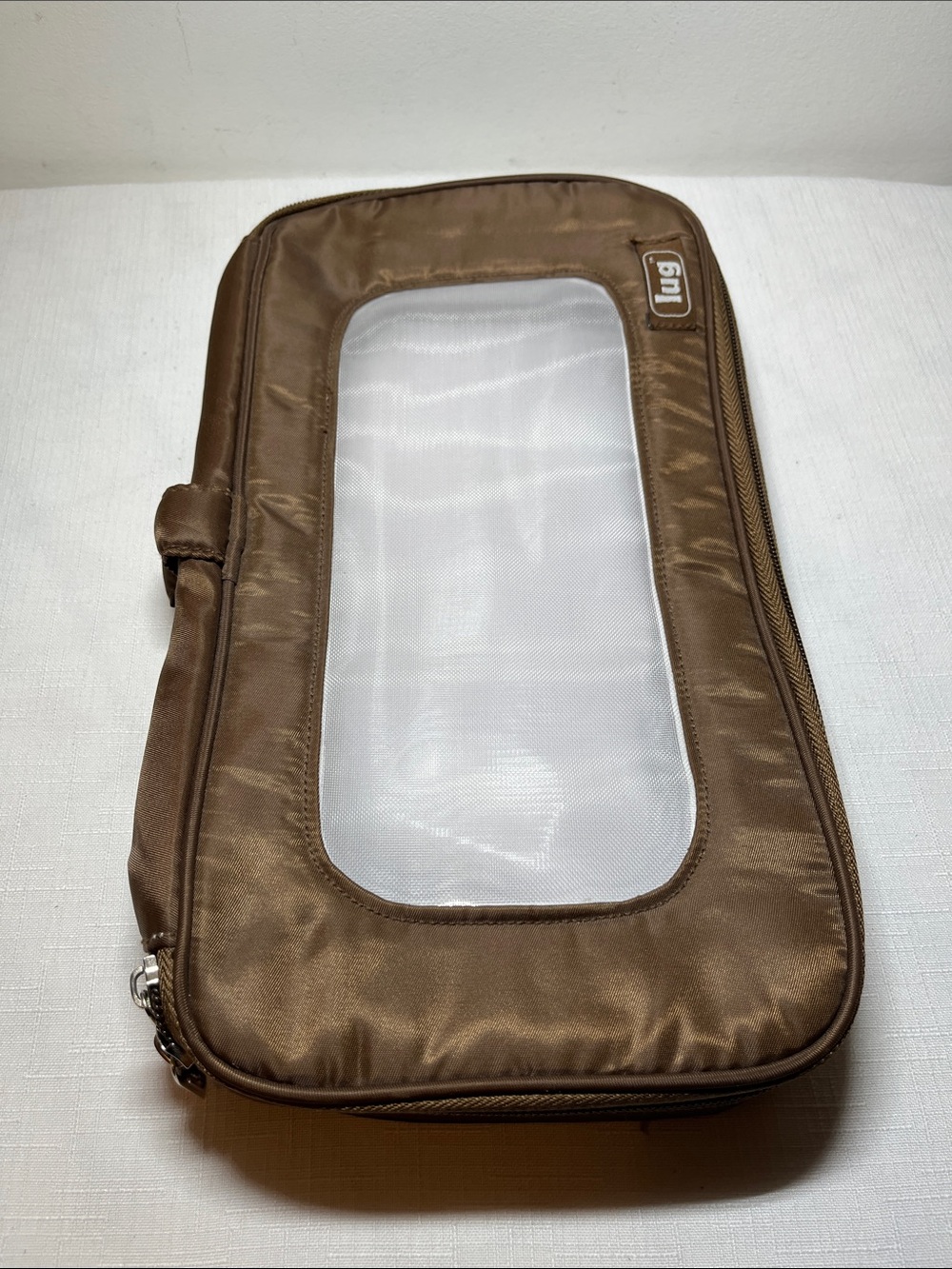 Lug clear-view travel organizer pouch 
zip-around closure
transparent window
NEW